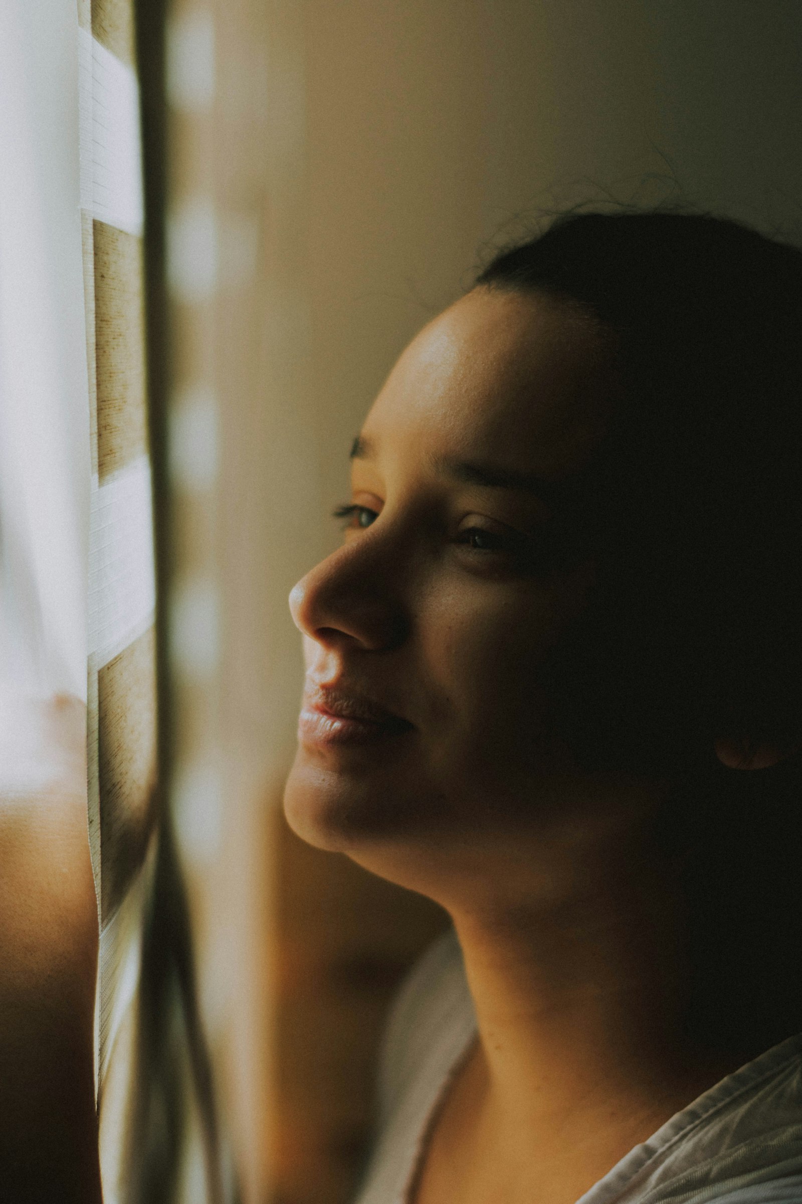 A woman looking toward the light
